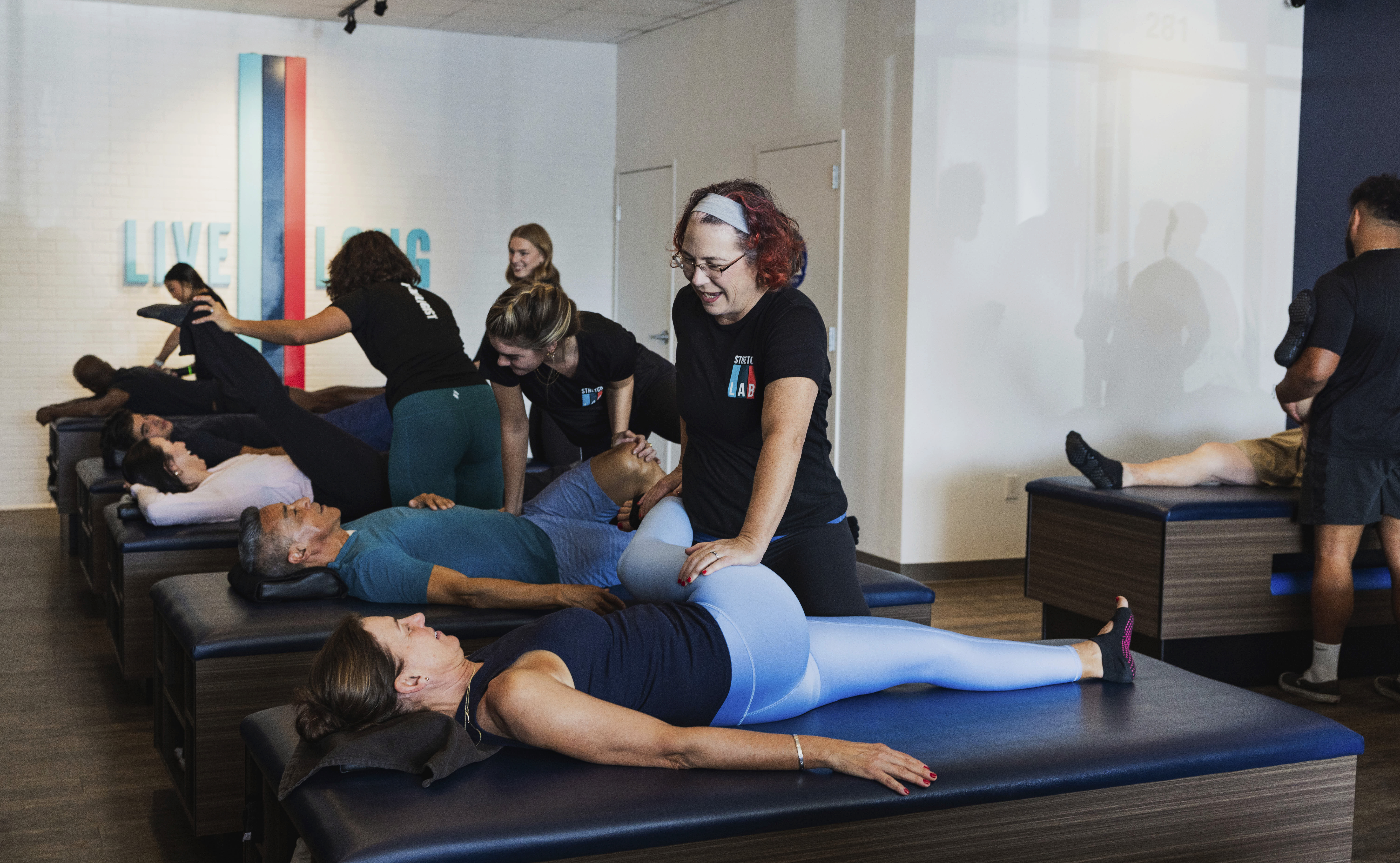 Flexologist stretching a women 